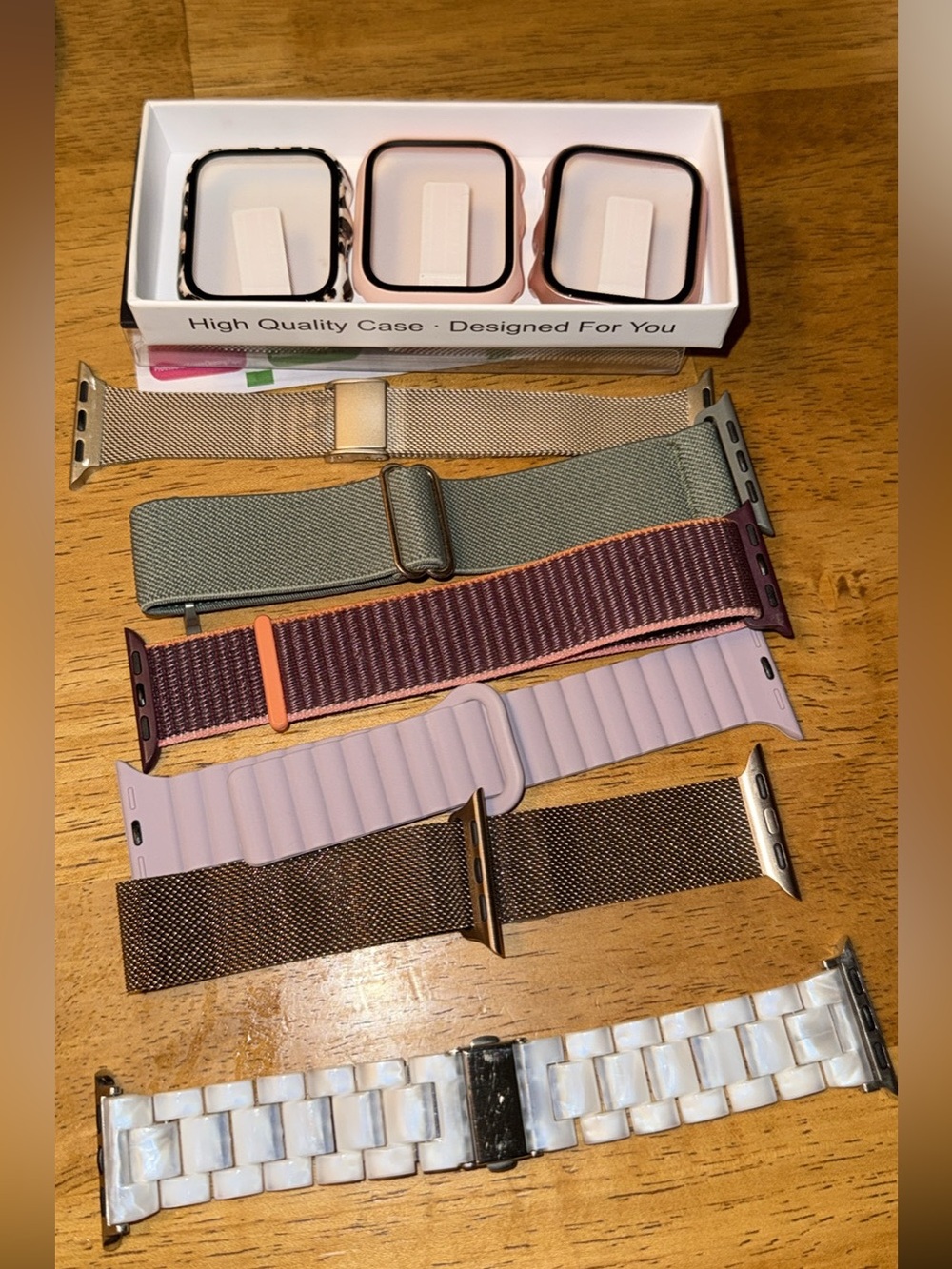 Set of Apple Watch Bands and Protective Cases